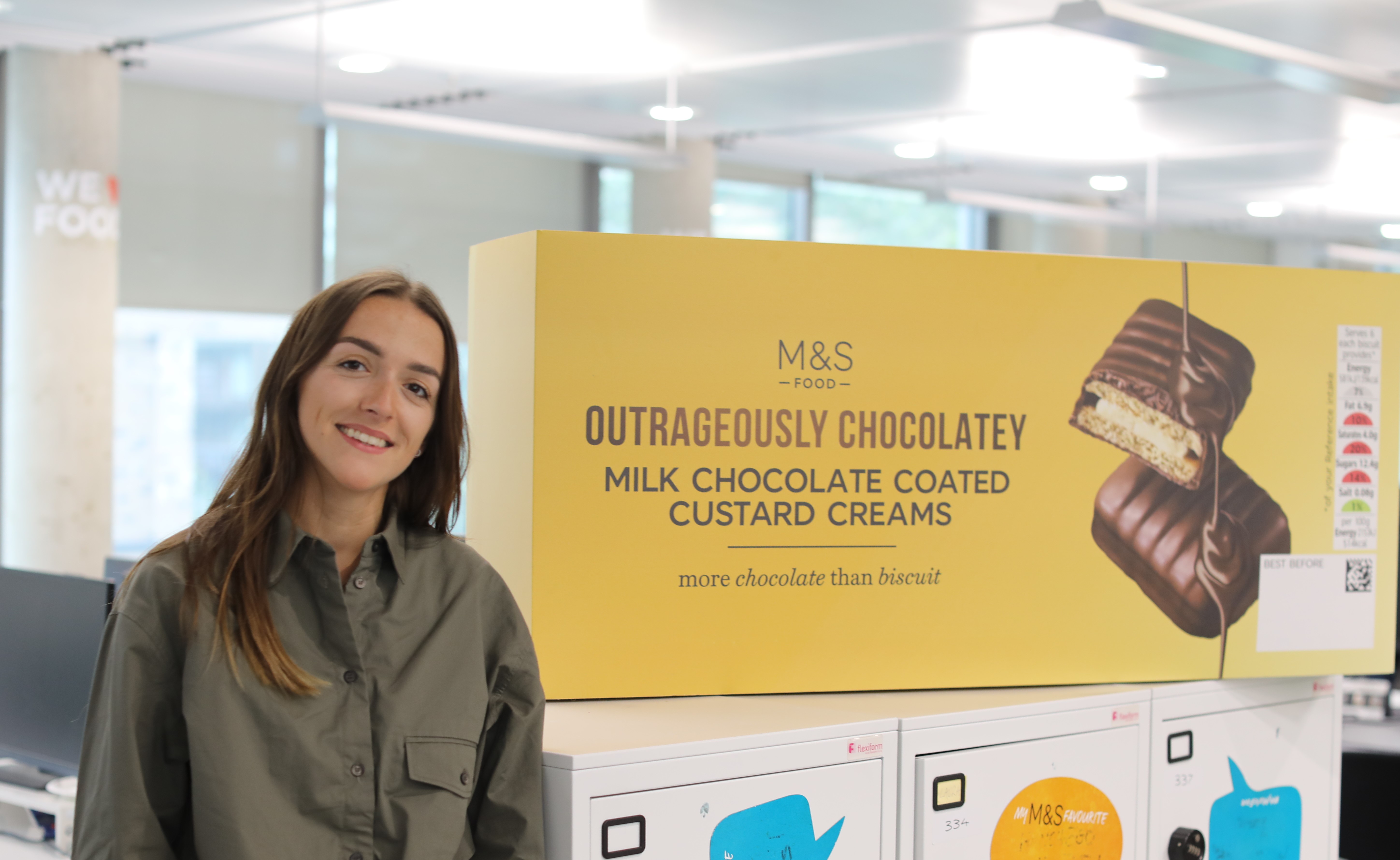 Product Developer Abbie with giant biscuit box CROPPED.JPG