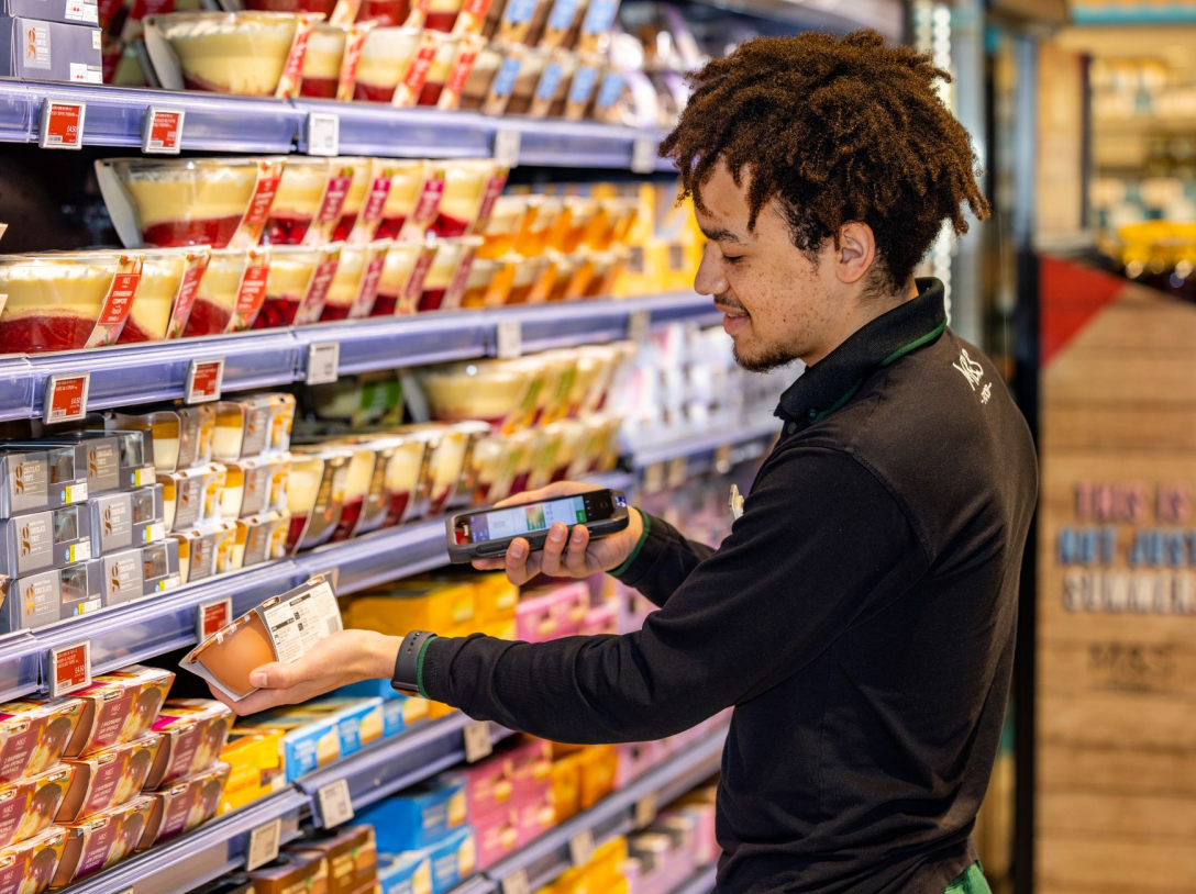 1088x814-young-man-stacking-shelves.png